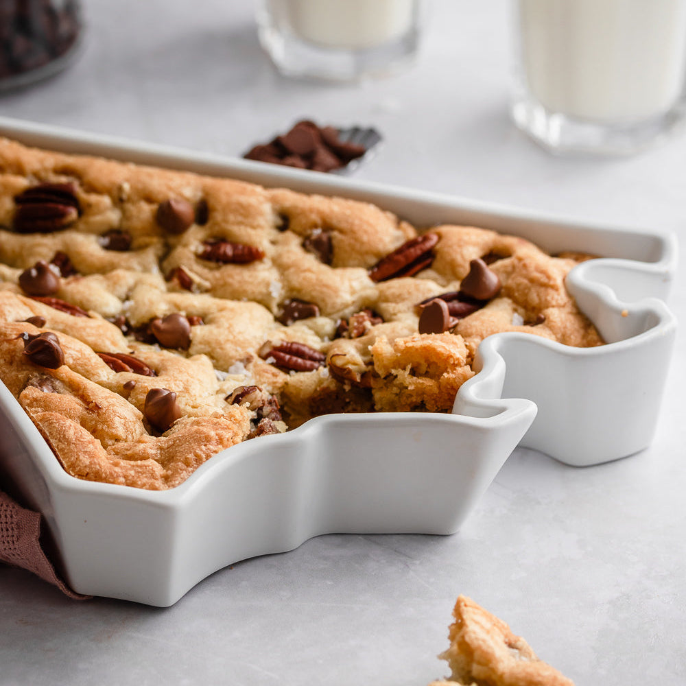 North Carolina pecan bar baked. North Carolina baking dish. North Carolina dessert dish. North Carolina pie plate. NC dessert dish. NC dessert recipe. NC pie dish. NC kitchen gift. NC baking gift. Close up of silhouette of tray.