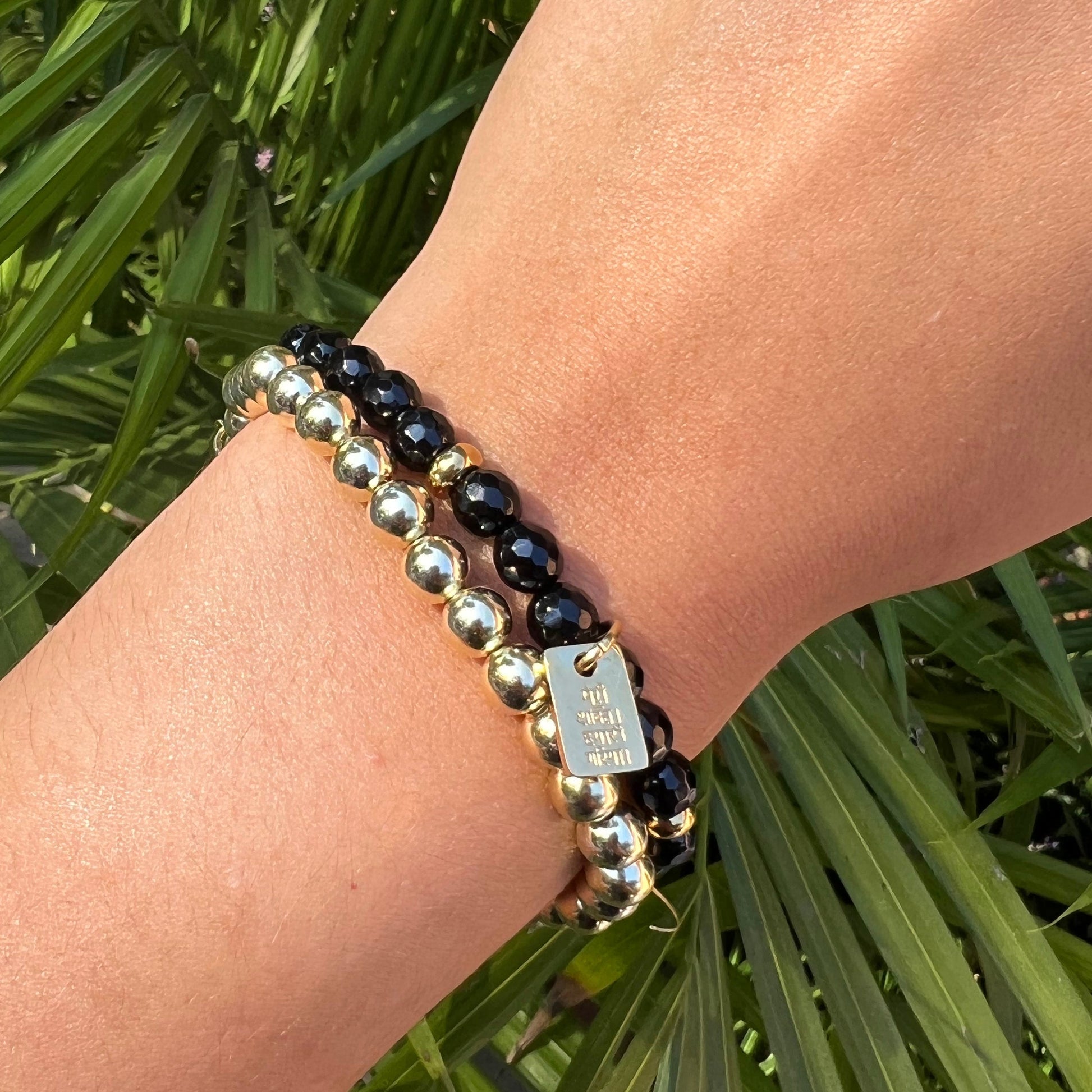 black onyx restore dignity bracelet stack