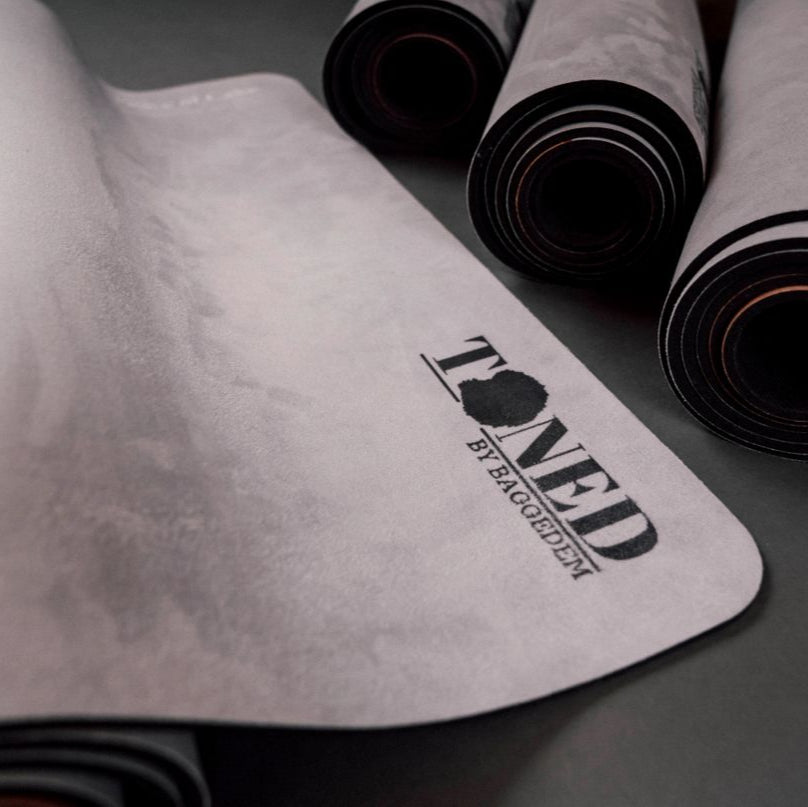 Custom made yoga mat design - 'Toned by Baggedem' brand logo