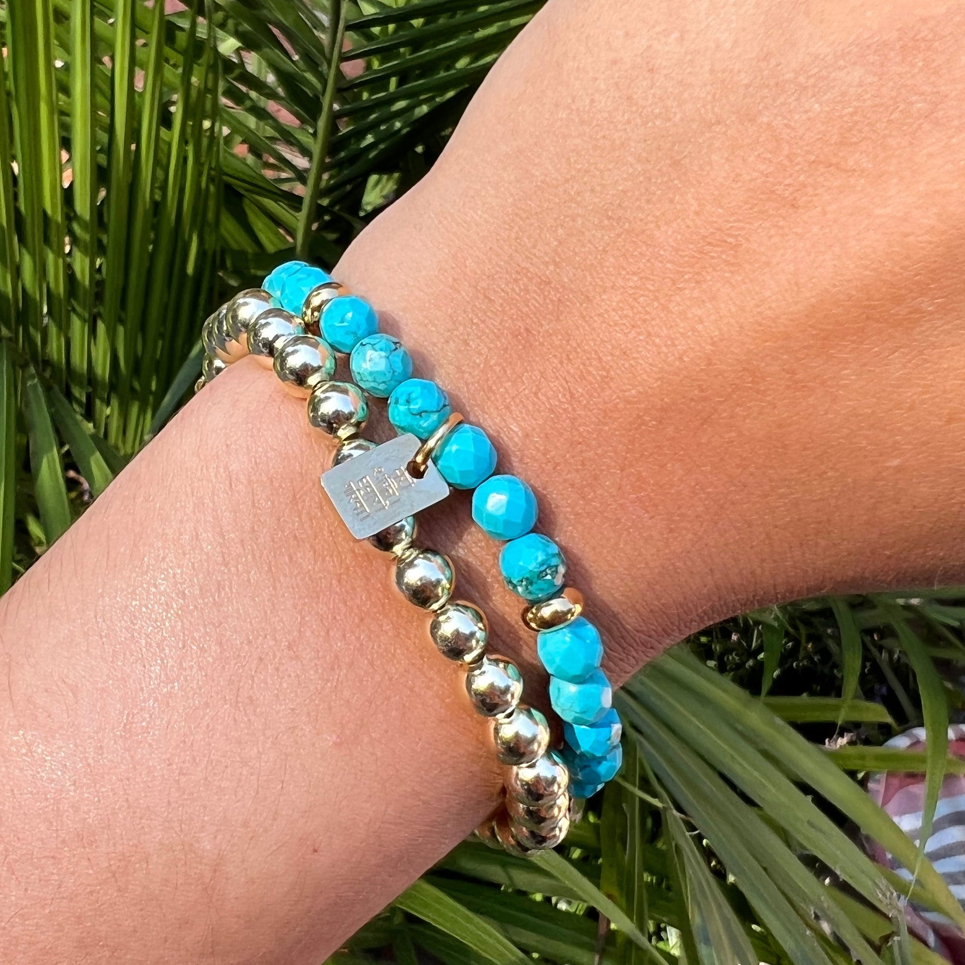 turquoise restore dignity bracelet and gold beaded bracelet stack